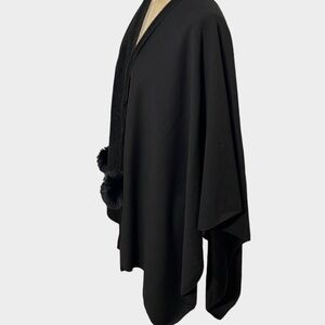 Marc NY black fleece cape with Pom Pom tie closure. Soft and cozy Very cute 
C